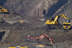 photography of excavators at mining area